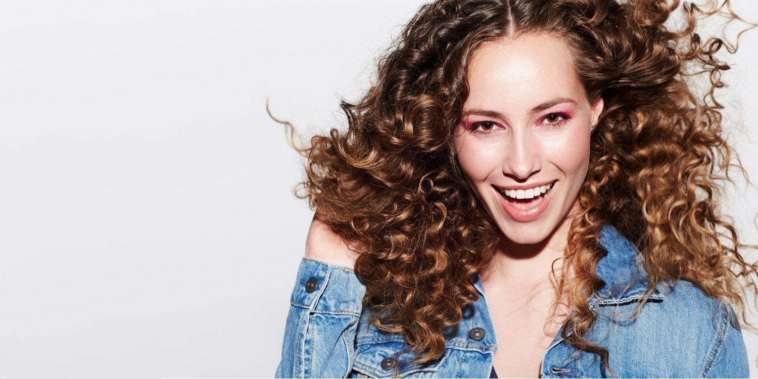 Naturally Curly Hair: How to Care for Your Curls | Matrix